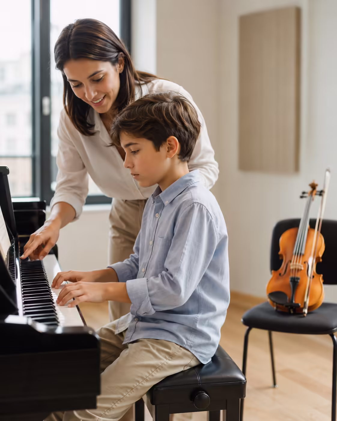 Piano teacher with violin as second instrument coordinating lessons